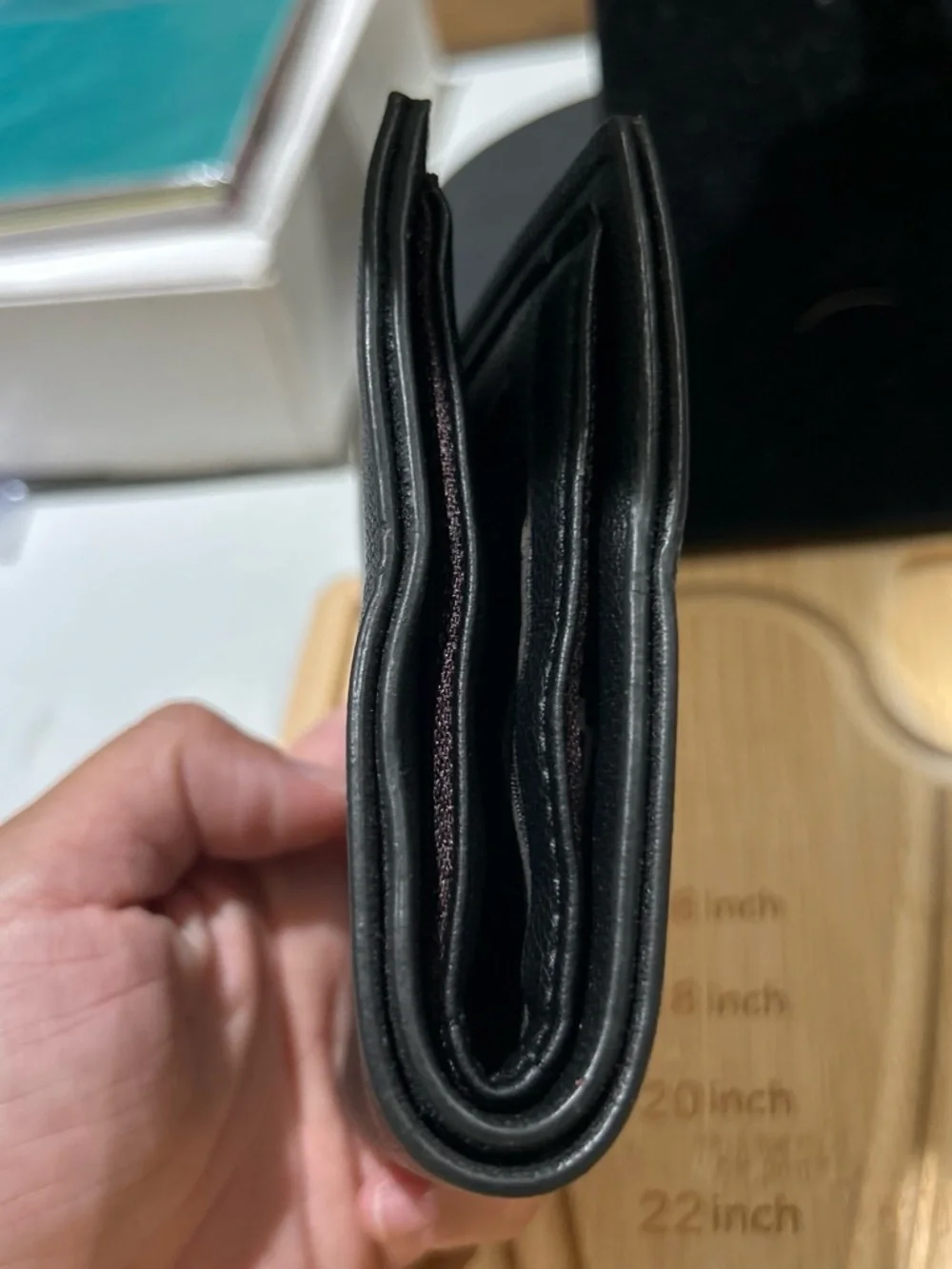 Black Leather Men’s Wallet have some wrinkle in the top